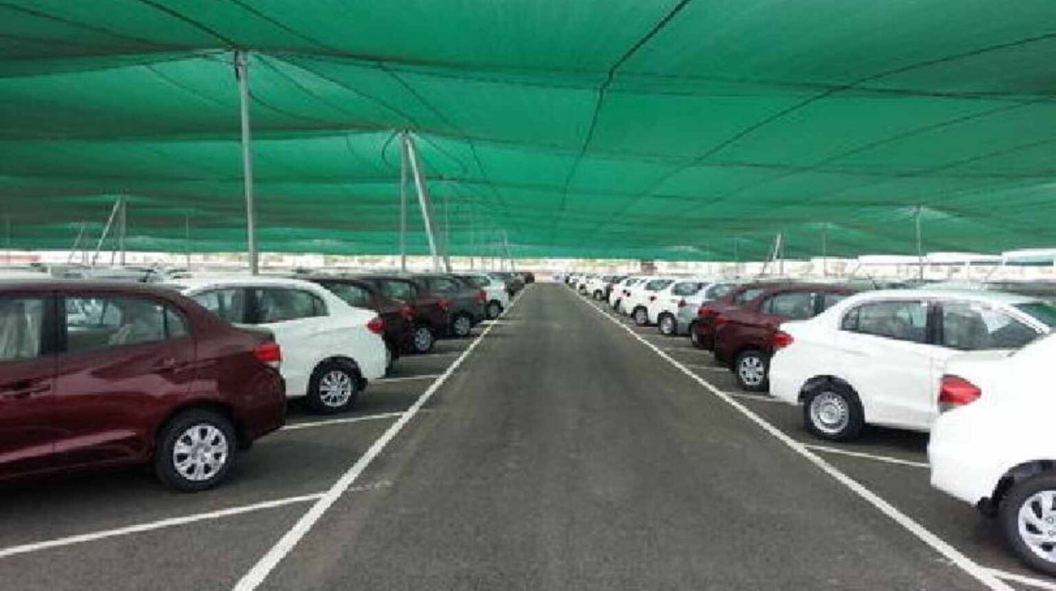 Car parking safety nets installed in a multi-level parking structure